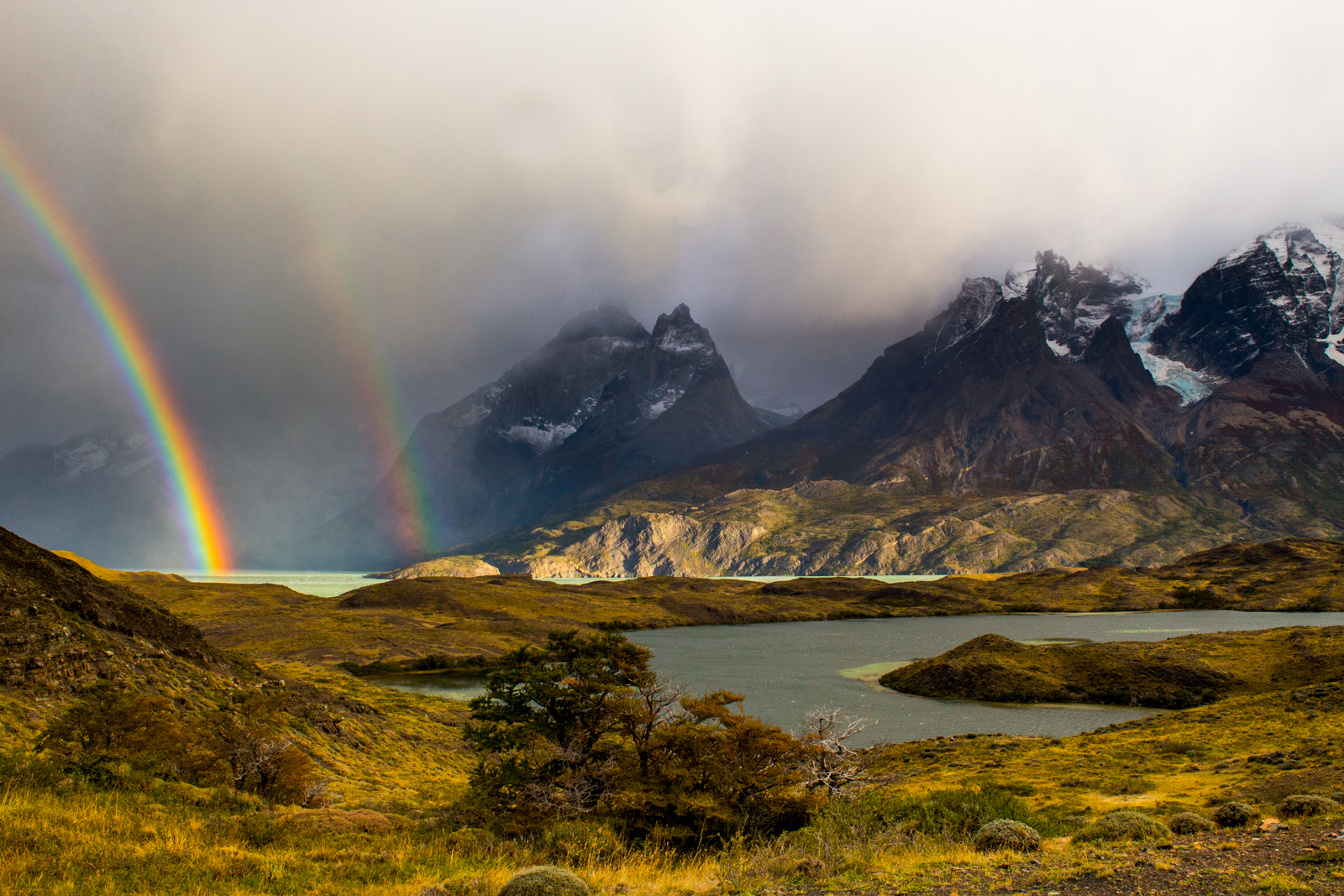 Double rainbow with lakes and mountains, Cuernos del Paine, Torres del Paine National Park, Patagonia, Chile